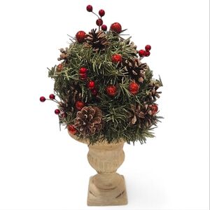 Holiday Greenery with Red Berries and Pinecones in an Urn